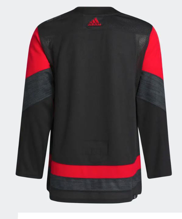 Men's Reebok NHL Carolina Hurricanes Red Hockey Jersey Shirt Size XL