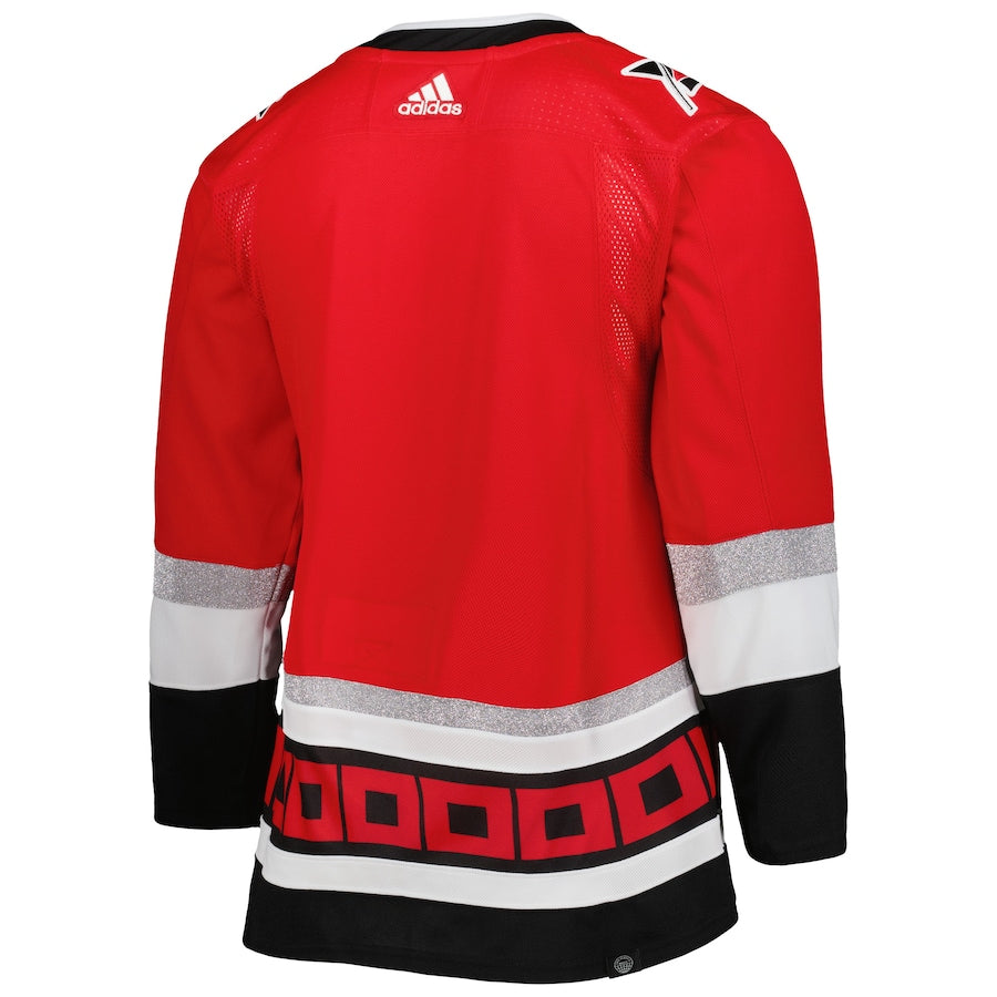 Men's Reebok NHL Carolina Hurricanes Red Hockey Jersey Shirt Size XL